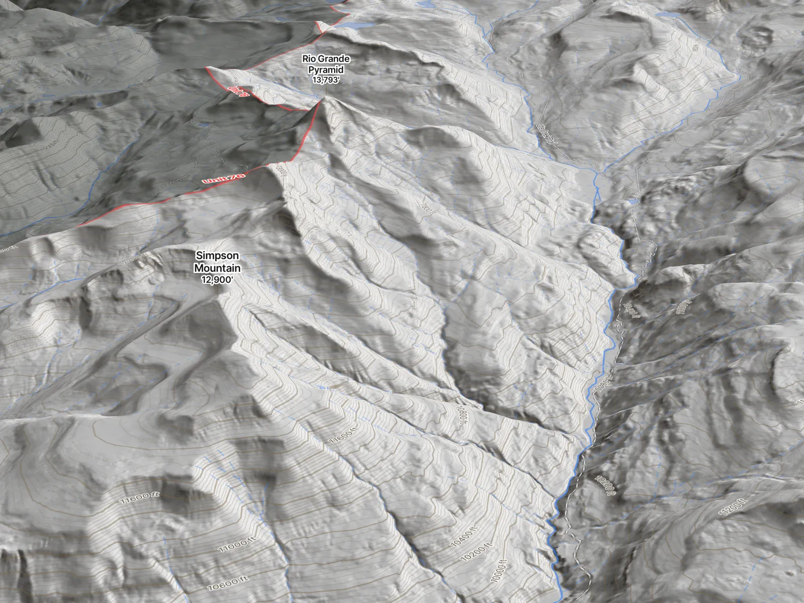 The same view on the LiDAR basemap: the ribs, benches and creek cuts under the timber.